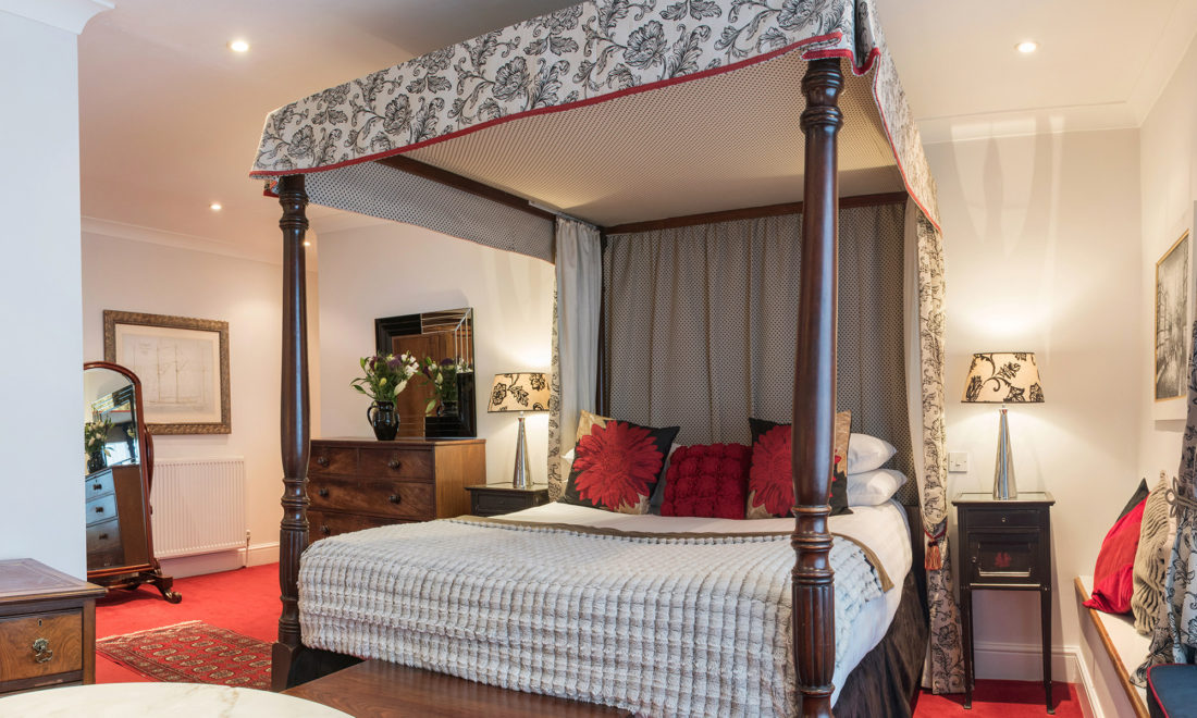 Four poster bed at The Royal Seven Stars Hotel